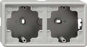 Surface mounted housing for flush mounted switching device  0062