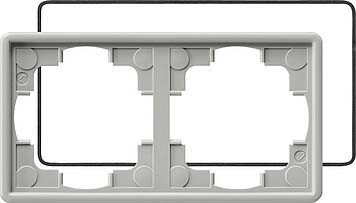 Cover frame for domestic switching devices 2 025242