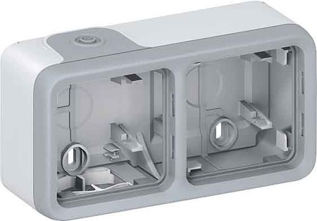 Surface mounted housing for flush mounted switching device  0696